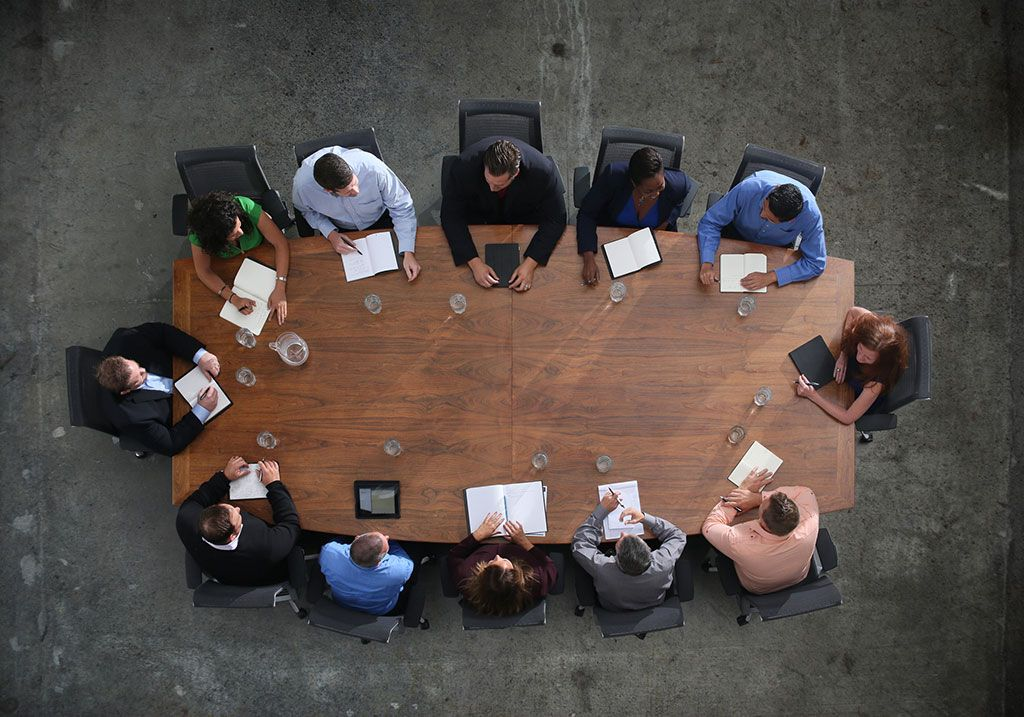 Multi-industry business team meeting